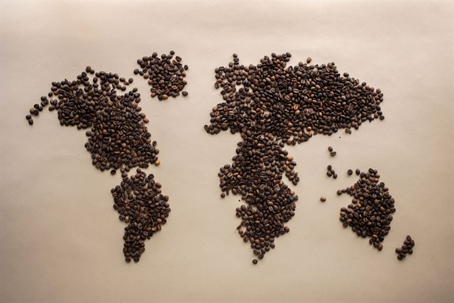 A world map made of coffee beans